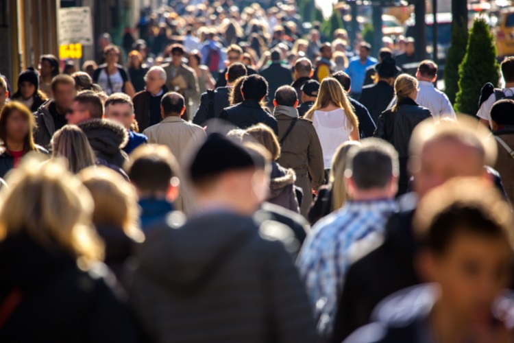 crowd walking down street